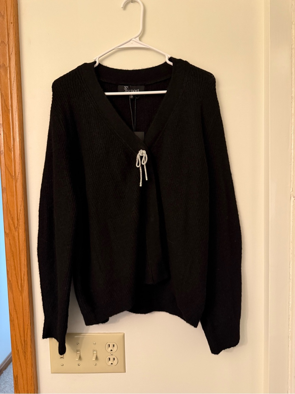 Button front Black Sweater Cardigan with crystal bow accent